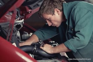 The Car Mechanician Behind Work